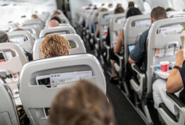 Crowded commercial airliner.